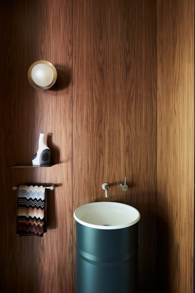 Modern coastal architecture & interior design of Casa Figueira, a luxury home with rammed earth walls & bespoke, crafted details in Sydney