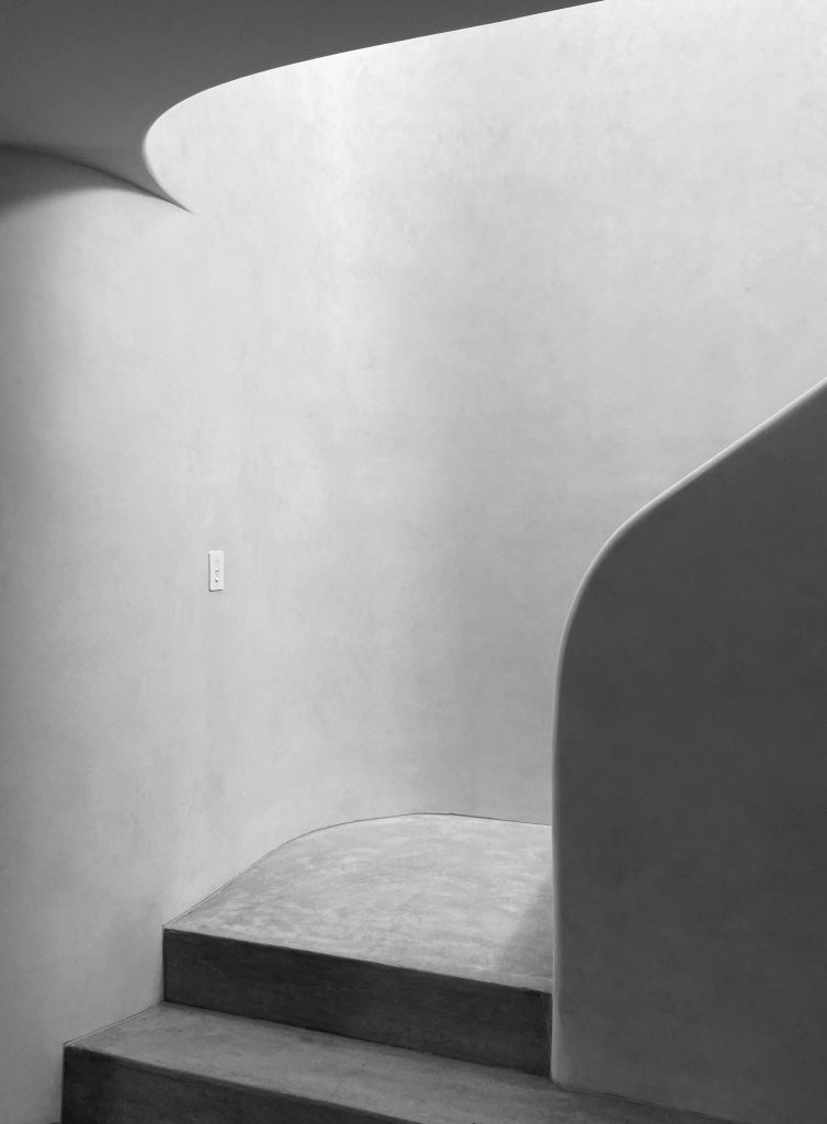 Sasso Nero, a luxury modern home by Buck&Simple, showcasing high-end coastal architecture and interior design on a complex Northern Beaches site.