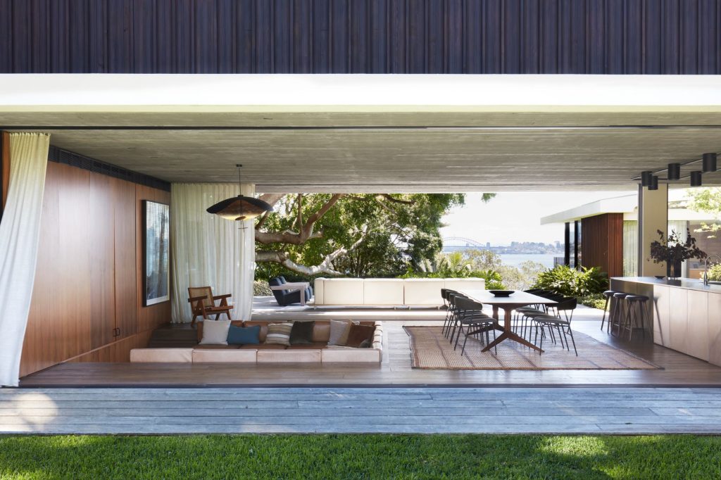 Modern coastal architecture & interior design of Casa Figueira, a luxury home with rammed earth walls & bespoke, crafted details in Sydney