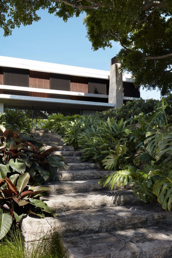Modern coastal architecture & interior design of Casa Figueira, a luxury home with rammed earth walls & bespoke, crafted details in Sydney